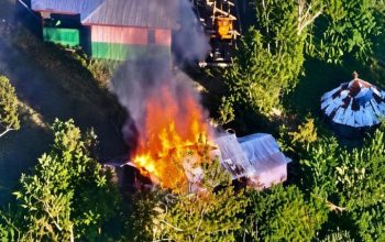 Tangkapan layar pemantauan pesawat nirawak Satgas Habema TNI terhadap rumah warga yang diduga dibakar KKB di Kabupaten Puncak, Papua Tengah, pada Senin (13/4/2026). Dok. Satgas Habema